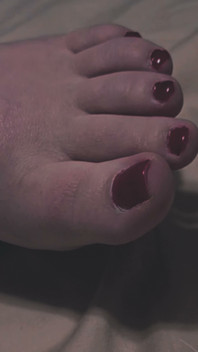 Sexy Red Toes in Bed