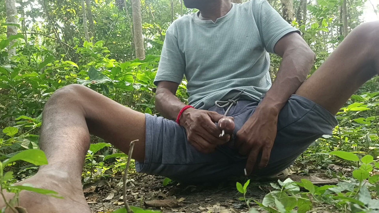 Ranjit Roy: Indian mature masterbating in forest.