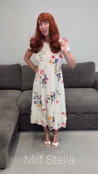 A Redhead in a Dress
