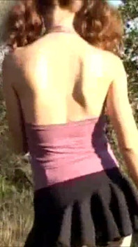 Horny brunette with big boobs masturbating outdoor
