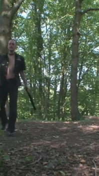 Humiliating whipping kneeling on the lake shore