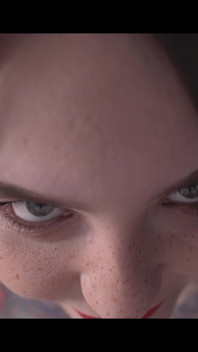 A Girl Is Messing with a Macro Camera