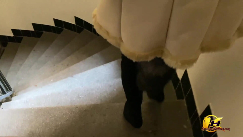 Katerina Hartlova: Big tits MILF with fox tail on stairwell in building