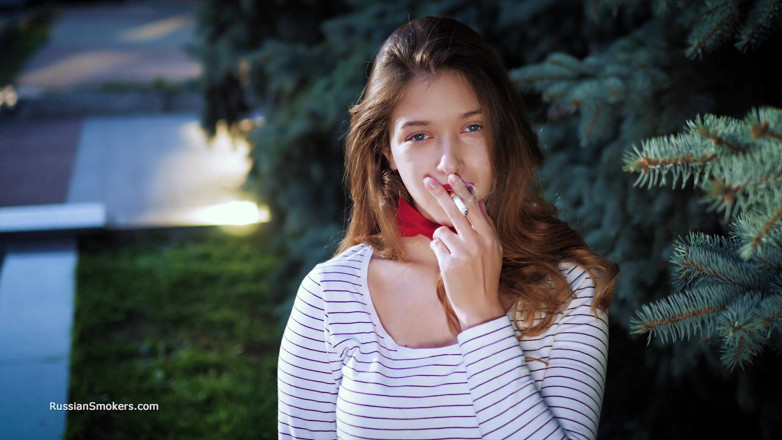 Russian Smokers: Sultry Russian Girl Smoking Cigarette by Waves