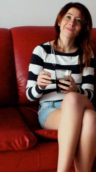 Skinny Redhead Smoking on a Couch