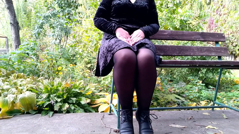 Elena: Peeing with legs spread wide on a bench in an...