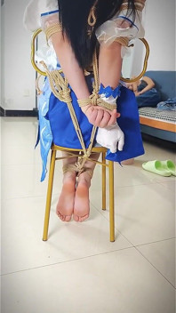 Cosplaying His Girlfriend Sitting Comfortably on a Chair with Ropes, Her Legs Hanging up