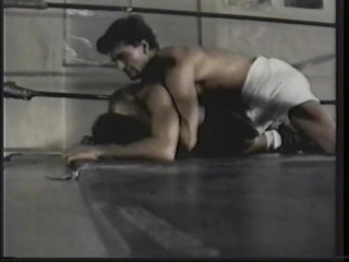 Gays Case: Fit hunks are on the floor of a rink wresting