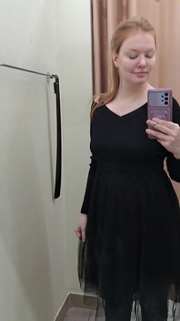 What Words Pop Into Your Head When You Look at the Red-haired Mistress in the Black Dress?