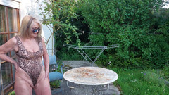 martinawest: Martina in a Shiny Leopard Swimsuit