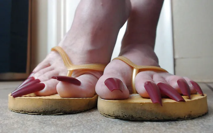 Abby Anna: Toenails hanging off yellow flip flops