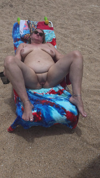 Laying with My Shaved Big Pussy Spread Wide Open on the Nude Beach to Tease Those Walking by and Looking BBW Swinger Wife Feet