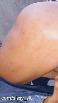 Femboy Piss and Flash Her Hot Feminized Body Outdoor Piss While in Chastity Cage and Rub Her Small Flaccid Cock