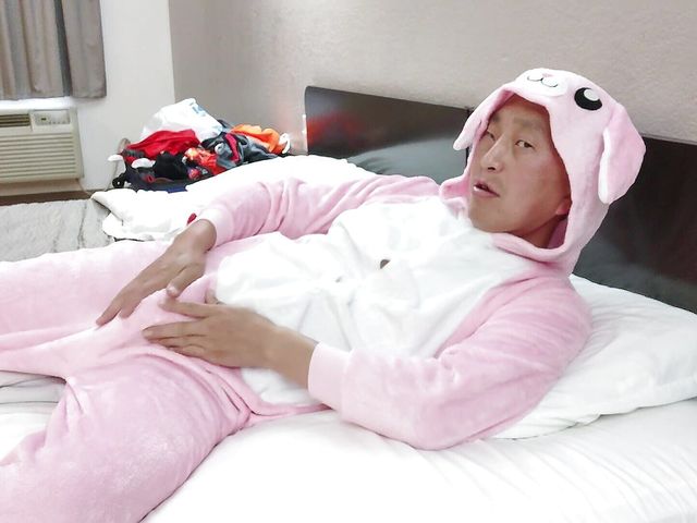 Hot Asian posing in my new pink onesie and zippered black boxer briefs in cheap motel (Cocky Rocky)