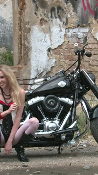 Skinny blonde on a bike