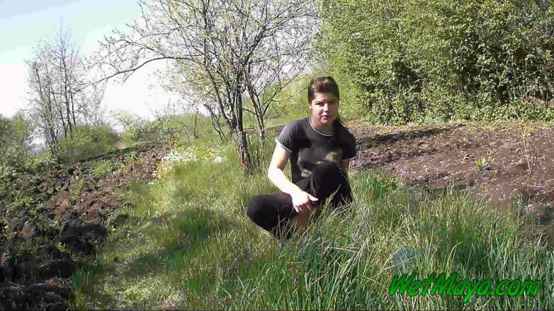 Wet Maya: Pissing in grass on the side of the road