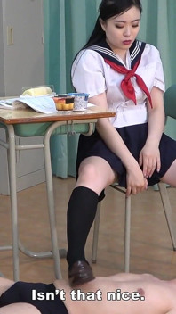 College Girl Stretches Her Legs Under the Desk While Studying and Plays with Teacher's Dick