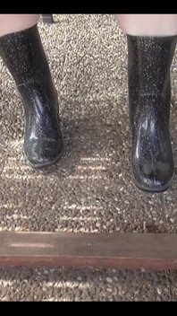 With Rubber Boots Outdoors