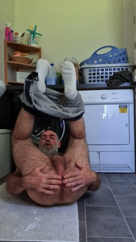 Hairy Bear Doing Laundry