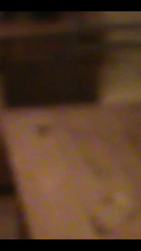 Robe-wearing Dominatrix