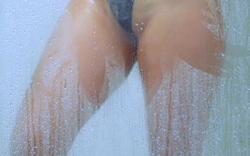 College Tanned Gorgeous Girl Take a Shower in Bikini