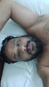 Indian Daddy Lying on the Bed Teasing and Posing for You