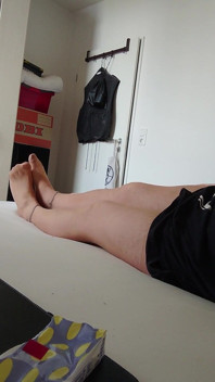 Nylonjunge in the Nightgown and Tights in Bed