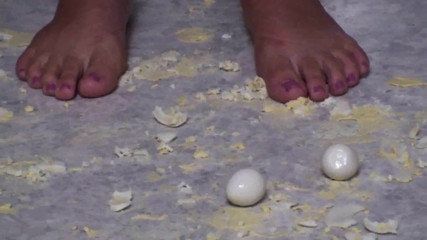 Foot Girls: Brunette crushing food in the kitchen
