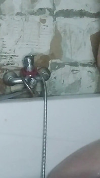 Camera in the Bathroom and a Girl with a Big Ass Is Peeing, Very Sexy