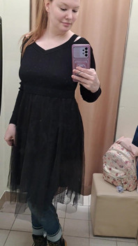 What Words Pop Into Your Head When You Look at the Red-haired Mistress in the Black Dress?