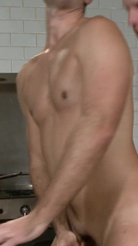 Gay cooks the kitchen while his boy is ready to surprise him from the back