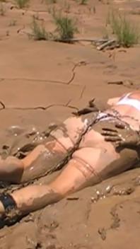 Julie Cunningham in Lingerie Wriggles Hard in Mud Hogtied with Chains. Sploshing Dirty Whore. Huge Tits Covered in Mud.