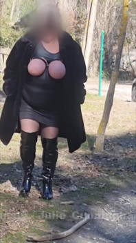 Julie Walking Through a Car Park Wearing Fur Coat, See Her Bound Tits Sticking Out