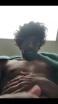 Masturbating