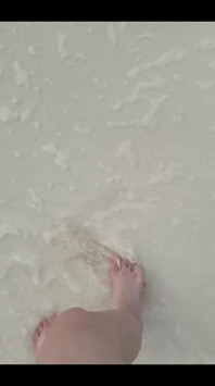 Running my bare feet on the white beach sand by the ocean.