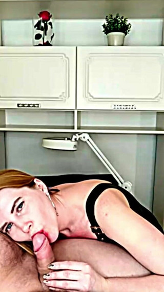 SugarNadya: A blue-eyed blonde in a black leather dress gives a...