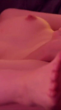 Short-haired blonde Emily masturbates on the bed