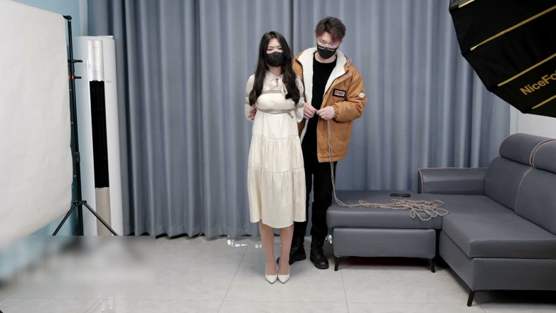 Asian bondage: Girlfriend in a Dress and Stockings, Bound by Rope