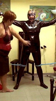 The Slave in Latex - Rough BDSM Action with Three People