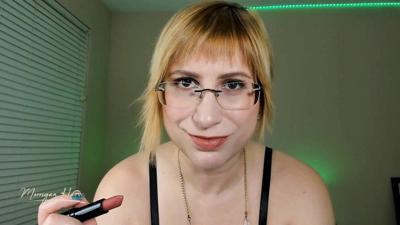 Morrigan Havoc: Applying beige nude lipstick in retro lingerie
