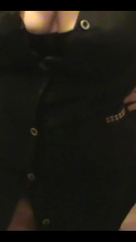 Robe-wearing Dominatrix