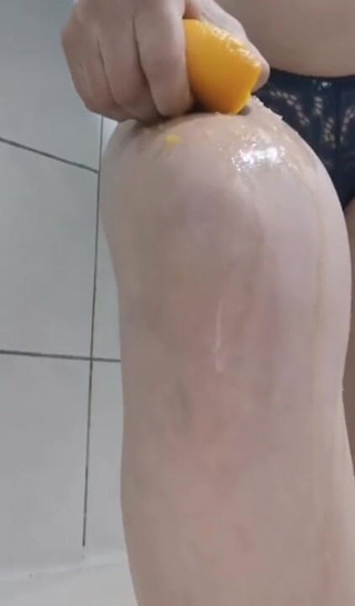 Erotic college: Sweet orange on my hot legs