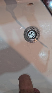 Pissing to the Bathroom Sink