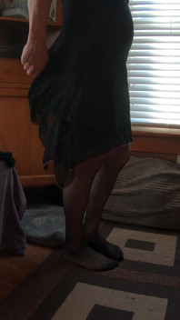 T-girl in Cute Minidress Dances Takes off Pantyhose and Teases