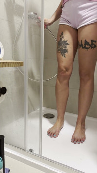 Tattooed Girl's Clean Bare Feet and Long Toes