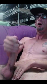 Masturbating