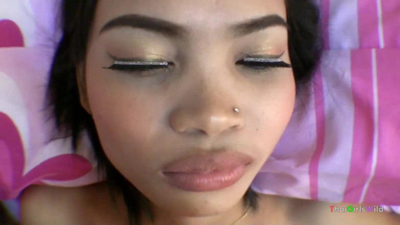 Thai Girls Wild: Dropping warm jizz on a pretty Thai girl's face