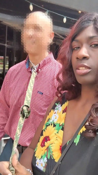 Queen Dreka Taking River on a Walk on His Lunch Break at His Corporate Job
