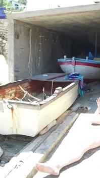 Chubby Brunette Pisses Masked Guy in Mouth on the Docks