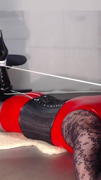 Hogtied in Boots, Fishnet, Red Pvc Suit and Masked. Struggling to Get Free.